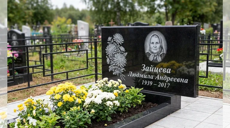Памятник с гравировкой хризантем — выполненная работа «Зайцева» во Владивостоке
