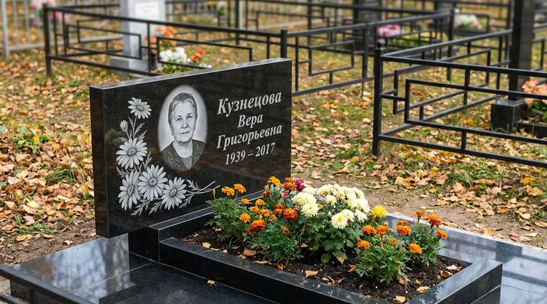 Памятник с гравировкой ромашек — выполненная работа «Кузнецова» во Владивостоке
